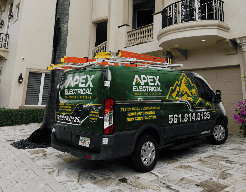 Licensed electrician installing EV charging unit and connecting wiring to panel