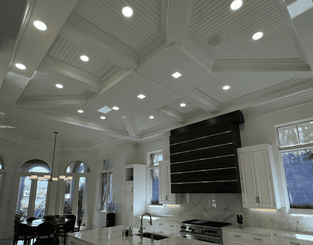 Electrician testing home electrical system components during safety inspection